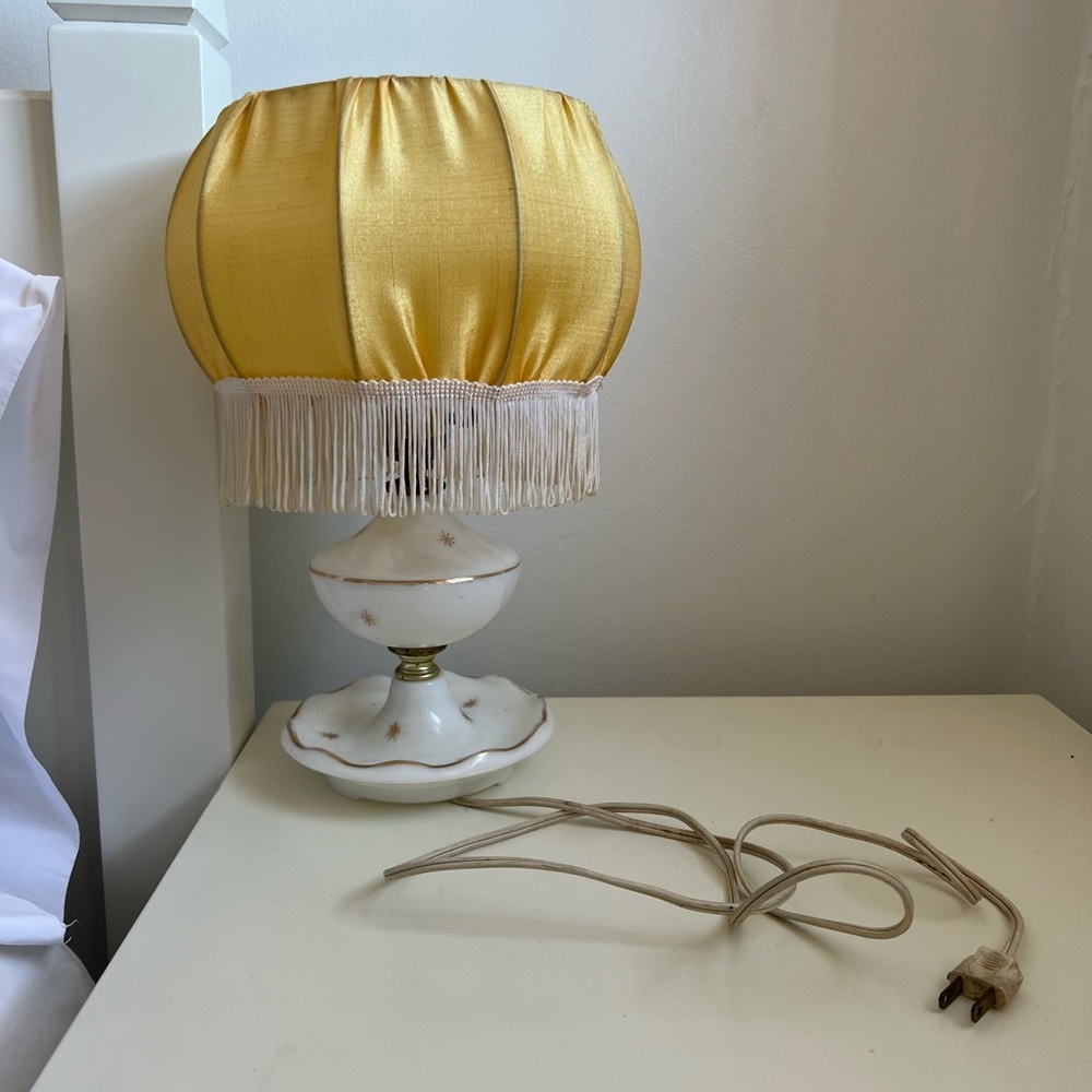 Antique goddess lamp with yellow silk shade